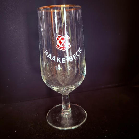 Other - Vintage Haake-Beck stemmed beer glass with gold rim and logo.